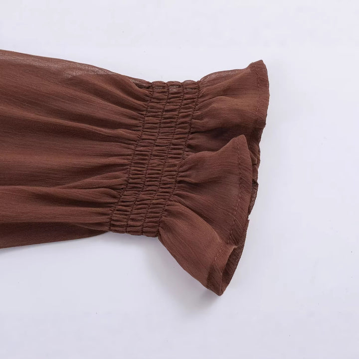 Damen Chiffonbluse mit Smokoberteil, voluminösen Ballonärmeln und Rüschenkragen Echoarchiv