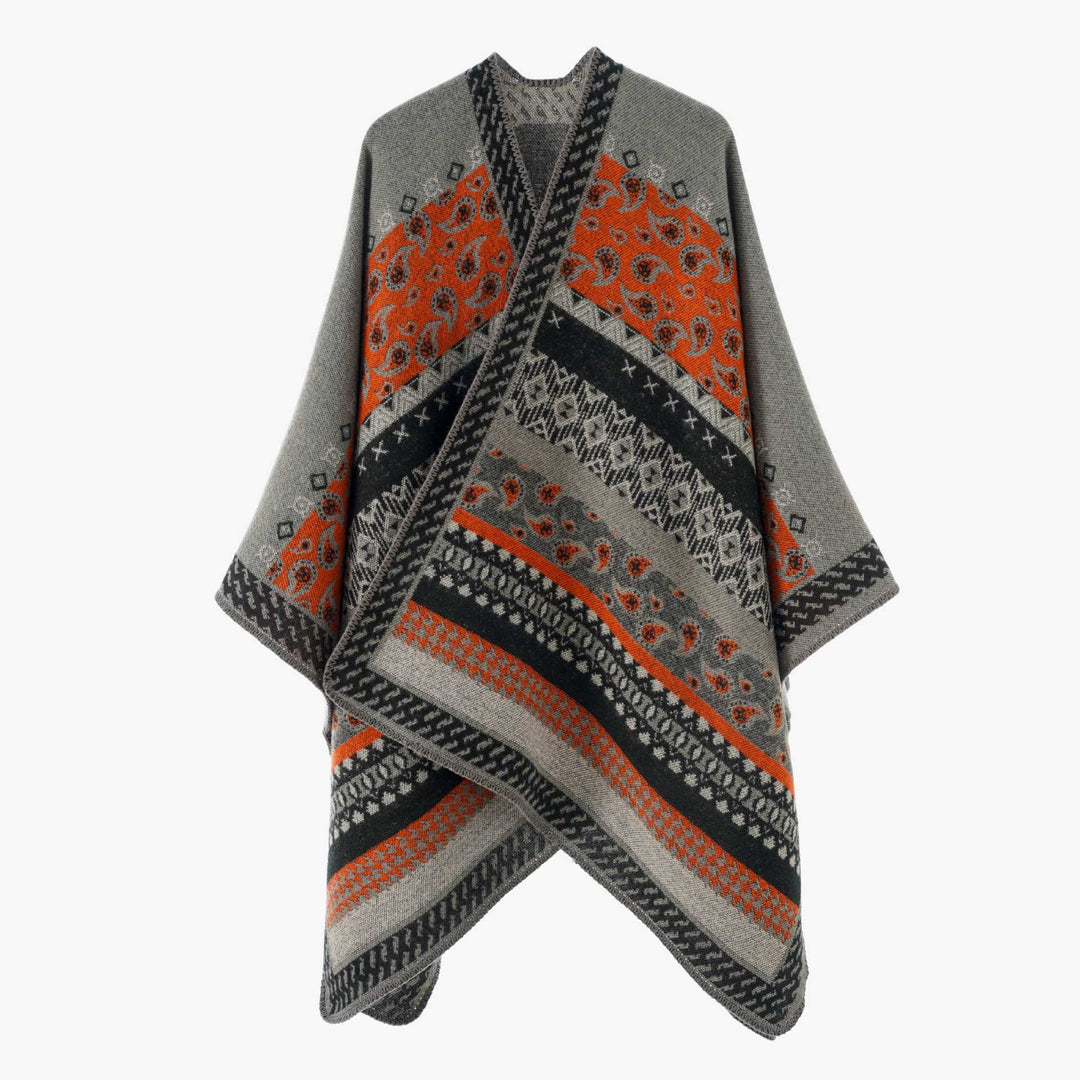 Damen Strickcape im Paisley‑Jacquard mit asymmetrischem Saum – Avérine
