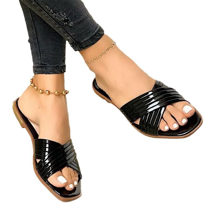 Damen Geflochtene Metallic-Slipper mit überkreuzten Riemen und flacher Komfortsohle – Lioré