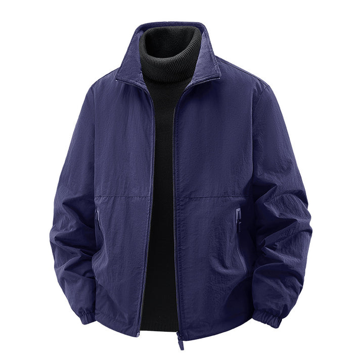 Men's minimalist stand-collar travel jacket with sealed zip pockets and elastic cuffs – Taviero