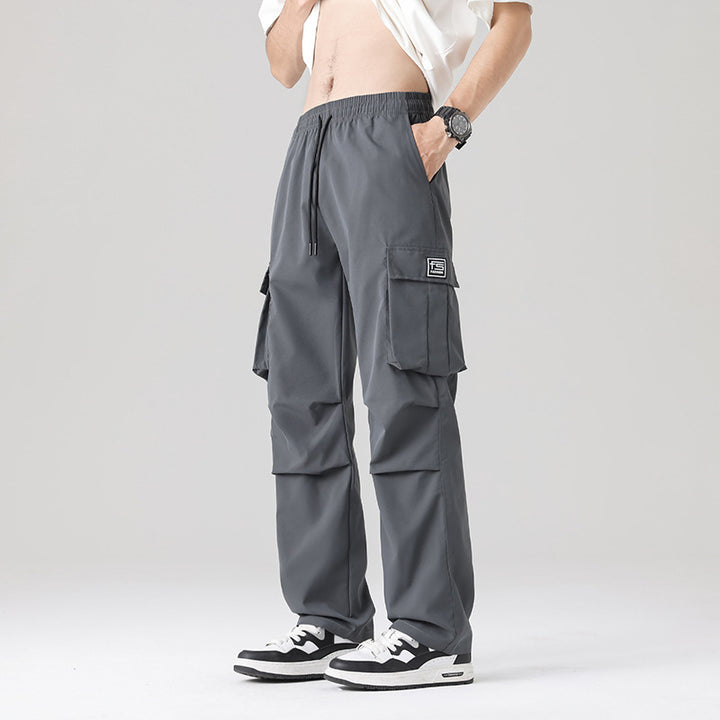 Herren Multifunktionale Cargo-Loungehose mit elastischem Tunnelzugbund, Mehrfachtaschen & verstellbarem Beinabschluss Echo Archiv