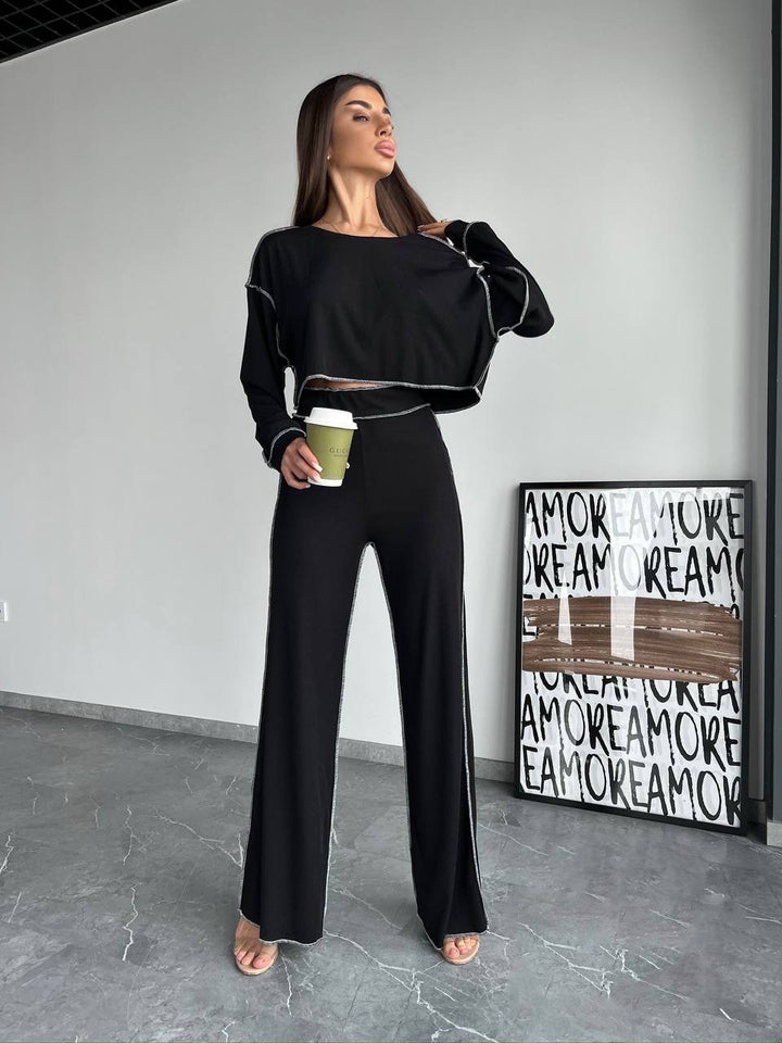 Damen Cropped Oversized-Sweatshirt mit Overlocknähten und High-Waist ausgestellter Hose Set – Avérine