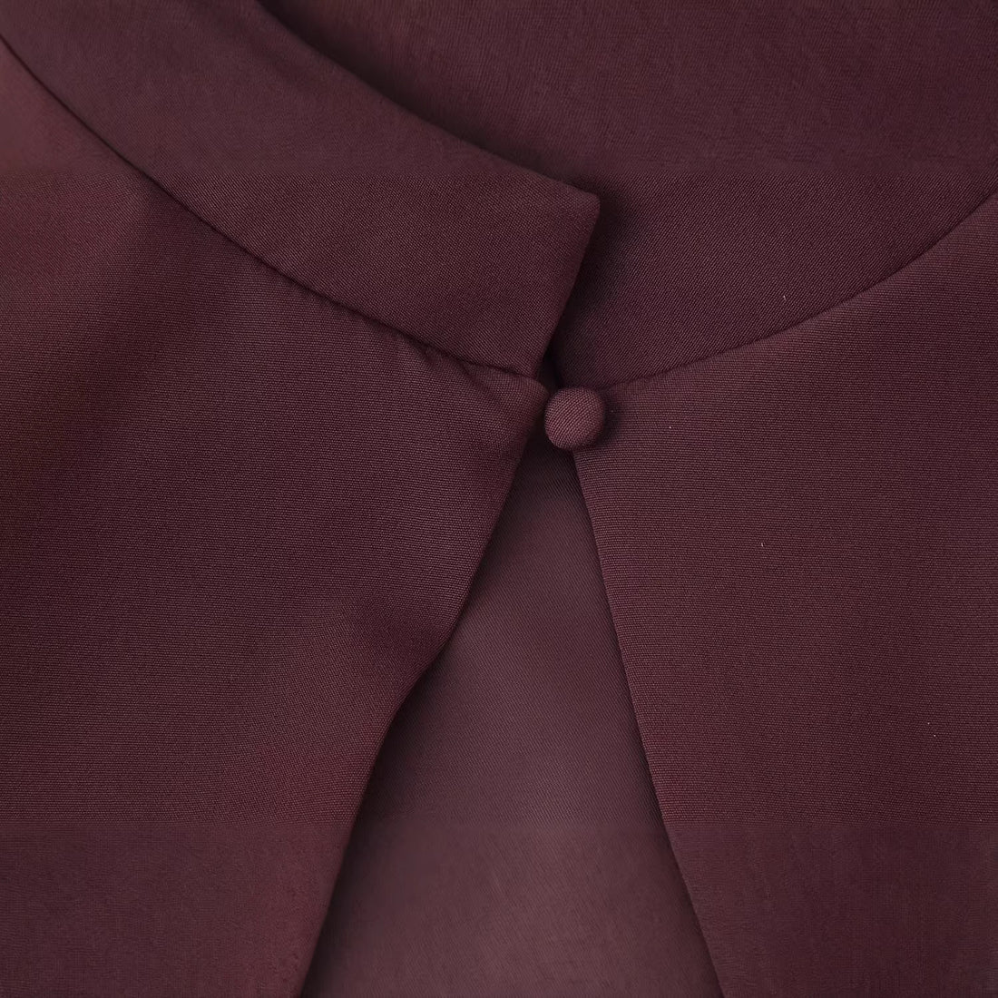Damen Top mit Capelet-Überwurf und taillierter Peplum‑Silhouette Echoarchiv