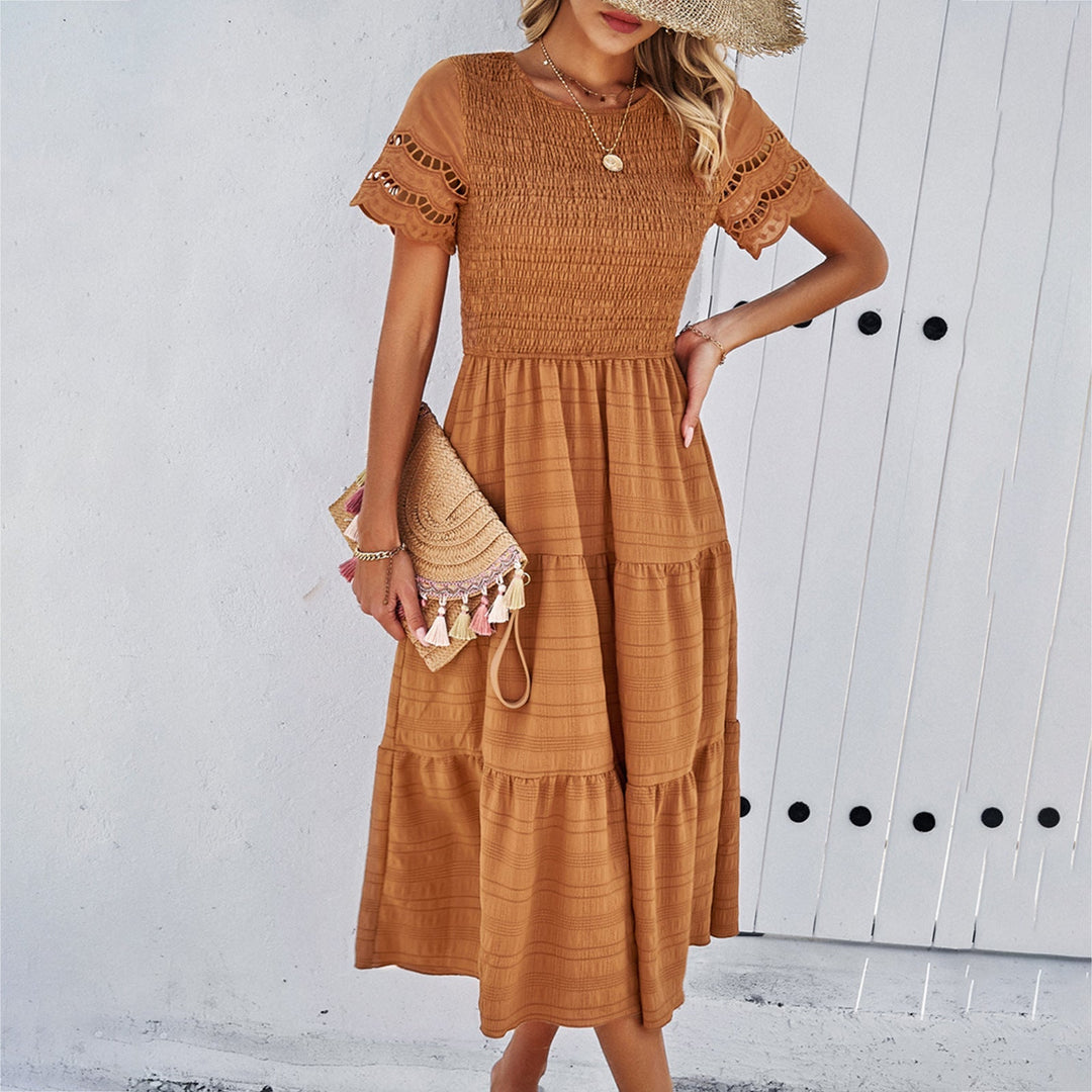 Damen Midikleid mit Puffärmeln und Elastischem Oberteil Echoarchiv