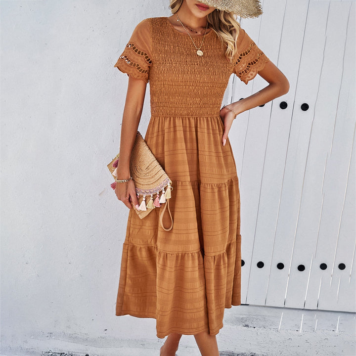 Damen Midikleid mit Puffärmeln und Elastischem Oberteil Echoarchiv