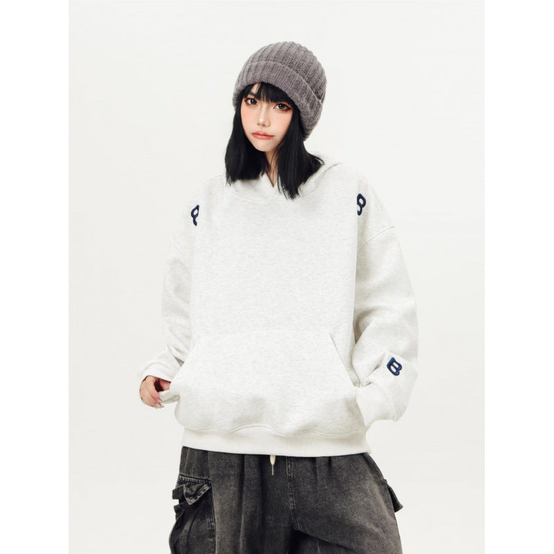 Unisex Oversized Kapuzenpullover mit großflächigem Intarsien‑Blockprint und geripptem Saum Echoarchiv