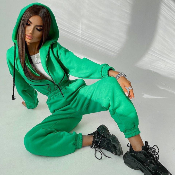 Damen Taillierter Kapuzen-Sweat-Jumpsuit mit Reißverschluss und elastischem Taillenbund – Solévia