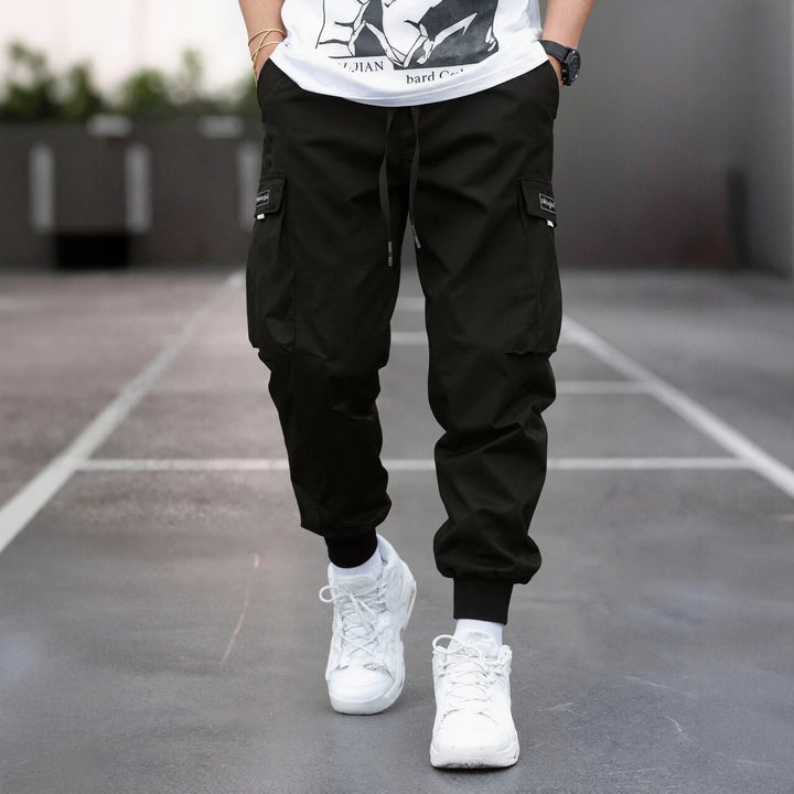 Herren Tapered Cargo-Joggerhose mit elastischem Tunnelzug, verstärkten Klappentaschen & gerippten Knöchelbündchen Echo Archiv