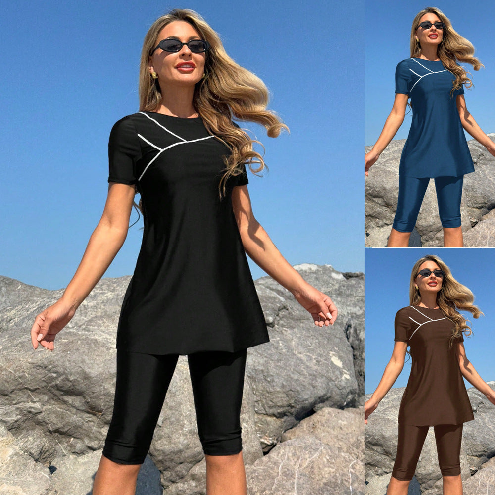 Damen Sportanzug mit kurzem Oberteil und Radlerhose Echo Archiv