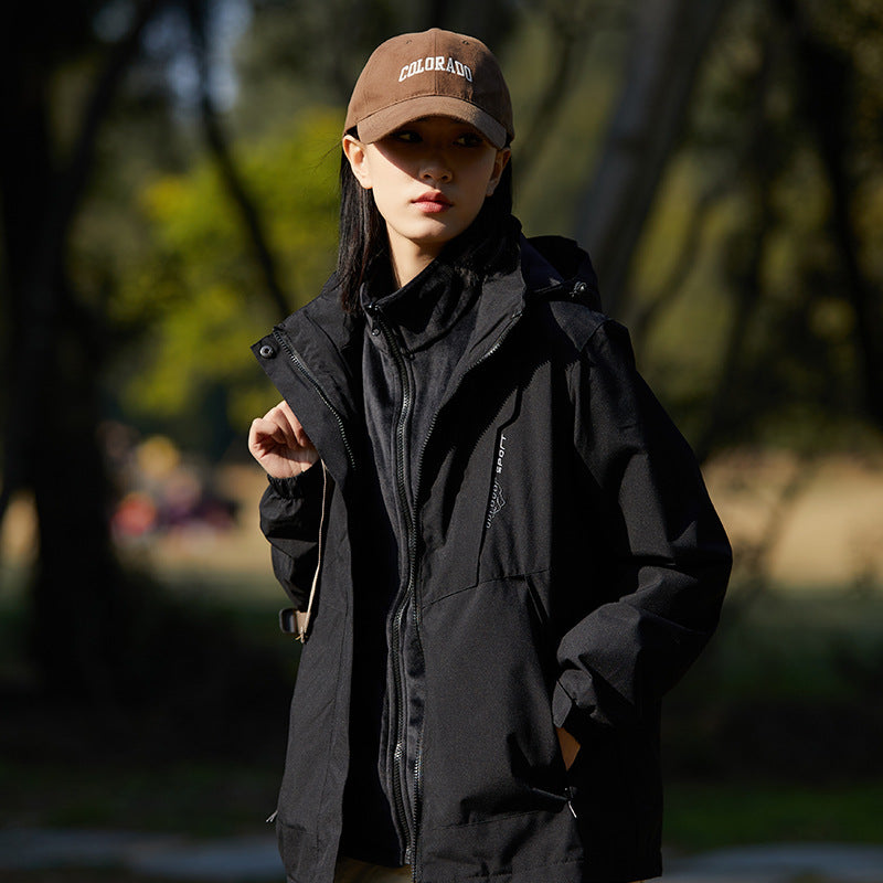 Damen zweilagige wasserabweisende Outdoorjacke mit Kapuze, Taillenregulierung und Kontrastbesätzen Echoarchiv