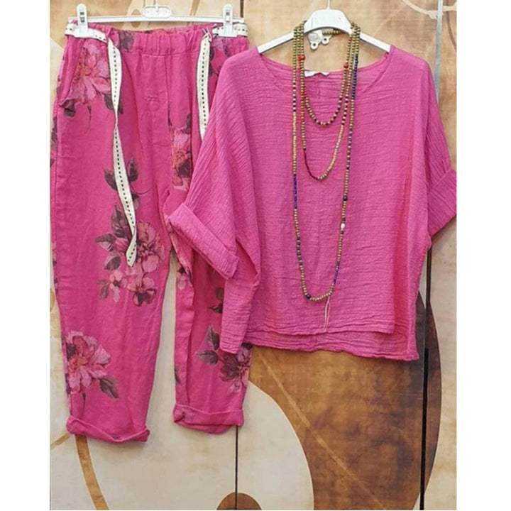 Damen nan leichtes Crinkle-Zweiteiler-Set mit lockerem U-Boot-Top und floral bedruckter Joggerhose Echo Archiv