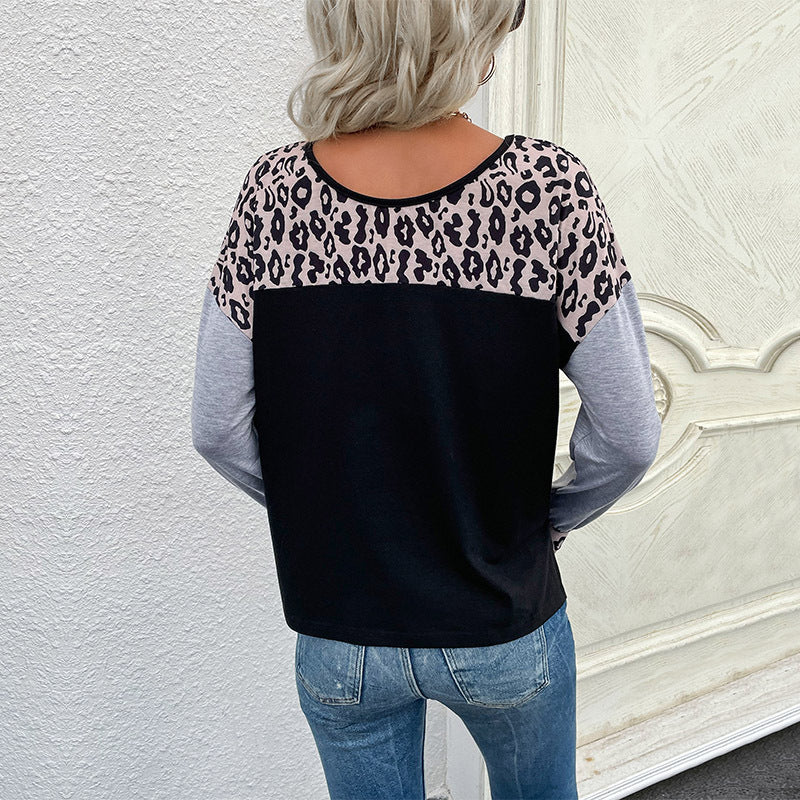 Damen Lässiges Jersey-Longsleeve mit Leo‑Yoke, melierten Ärmeln und lockerer Passform – Avérine