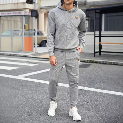 Herren Sportliches Lounge-Set mit stylischer Kapuze und praktischen Taschen Echoarchiv