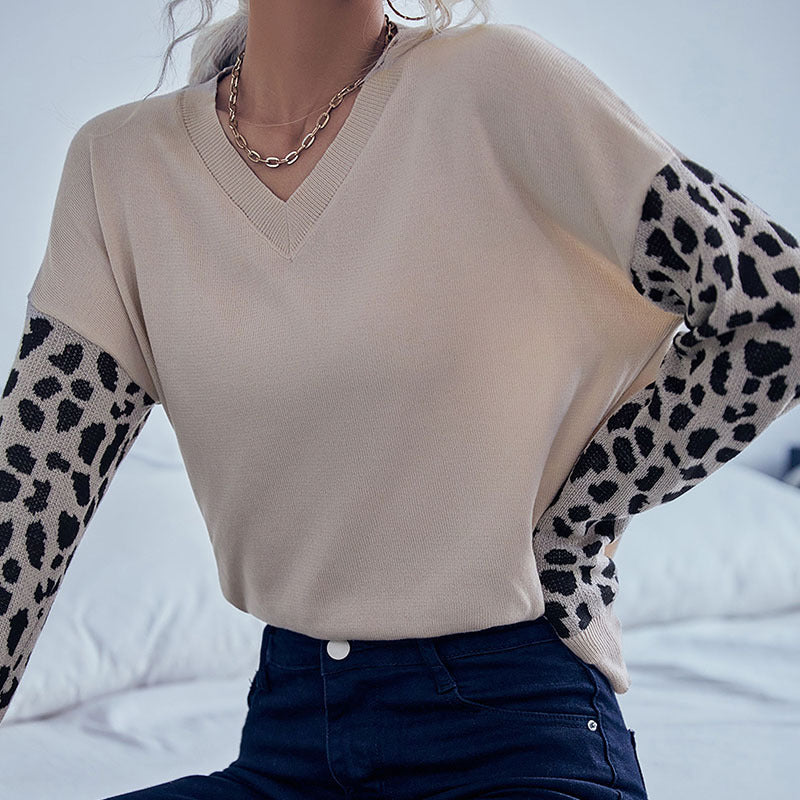 Damen V‑Ausschnitt Feinstrickpullover mit Leo‑Jacquardärmeln und überschnittener Passform Echoarchiv