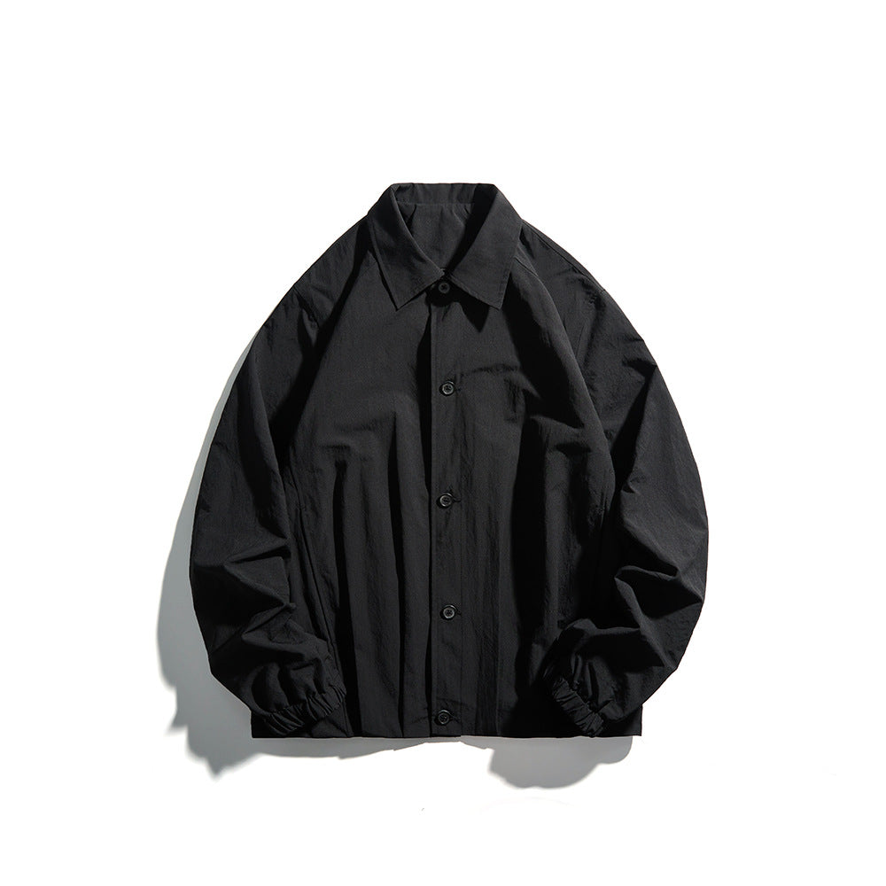 Unisex Leichte Hemdjacke im Boxy-Schnitt mit Holzknopfleiste und elastischen Bündchen Echoarchiv
