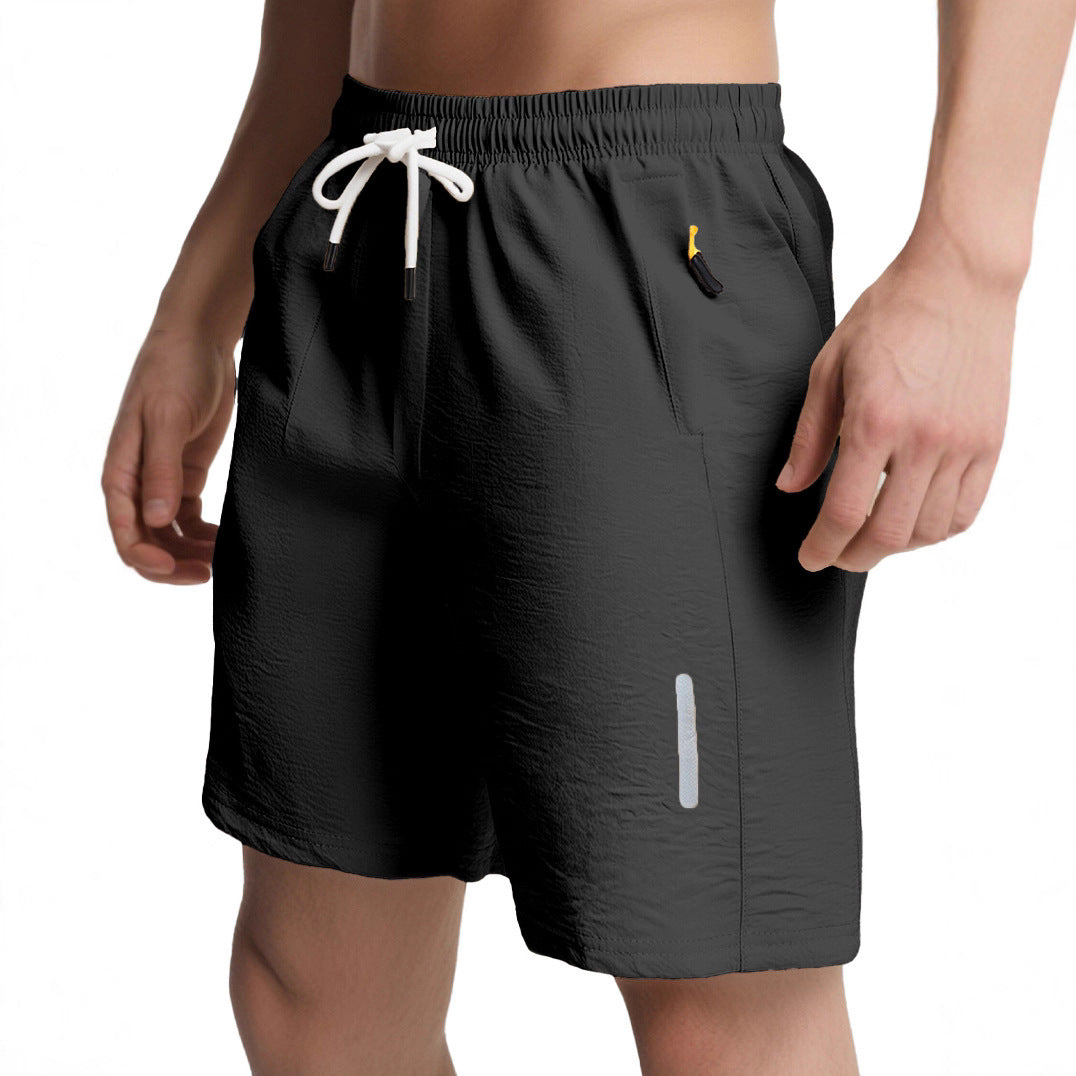 Herren nan ultraleichte schnelltrocknende Sport- und Badeshorts mit Elastikbund Kordelzug Reißverschlusstasche und reflektierendem Detail Echo Archiv