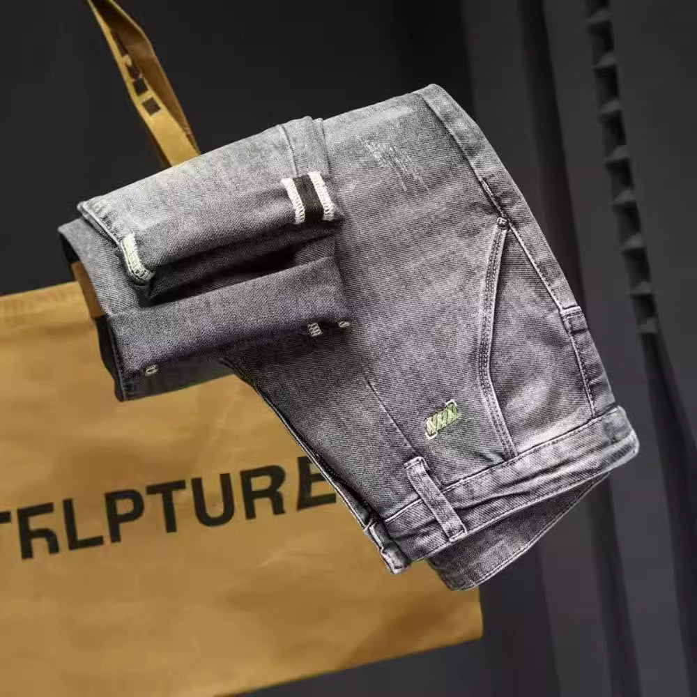 Herren lässige Jeans mit modernen Used-Effekten und konisch zulaufendem Bein Echoarchiv