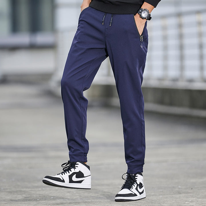 Herren Technische Softshell-Jogginghose mit wasserabweisender Membran, Reißverschlusstaschen und elastischem Kordelbund Echo Archiv