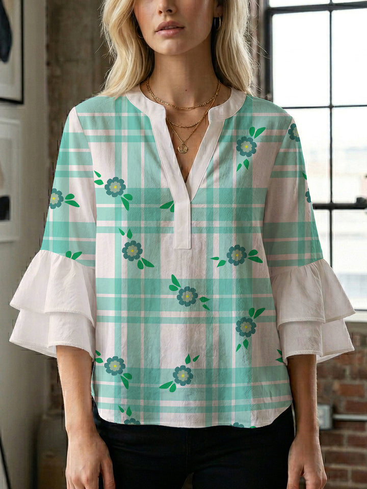 Damen Bluse mit voluminösen Flügelärmel und intensivem Blattmuster Echo Archiv