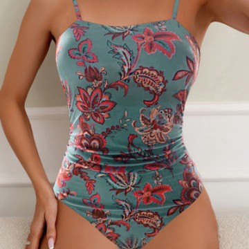 Damen Einteiler Badeanzug mit floralem Raffungselement Echo Archiv