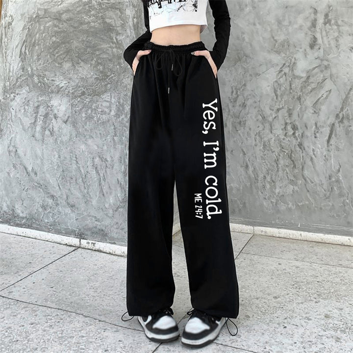 Damen weite Jogginghose hochgeschnitten mit seitlichem Statementprint und elastischem Bund – Avélisse