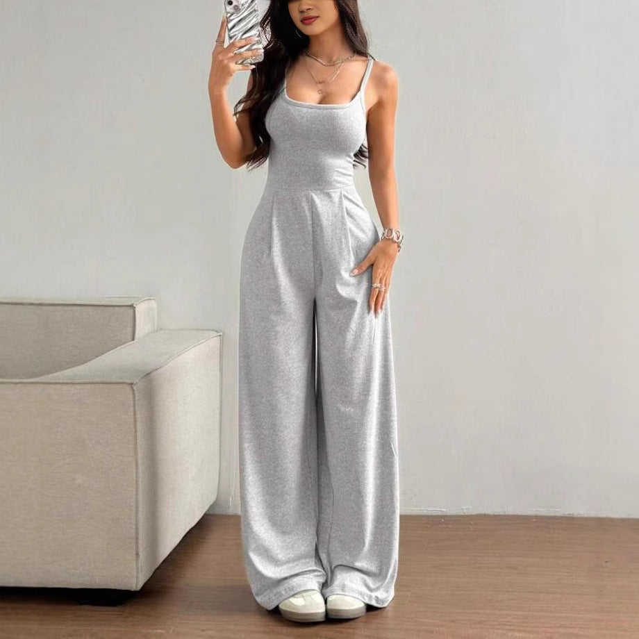 Damen Eleganter Jumpsuit mit weitgeschnittenen Beinen und schmeichelndem Oberteil Echo Archiv