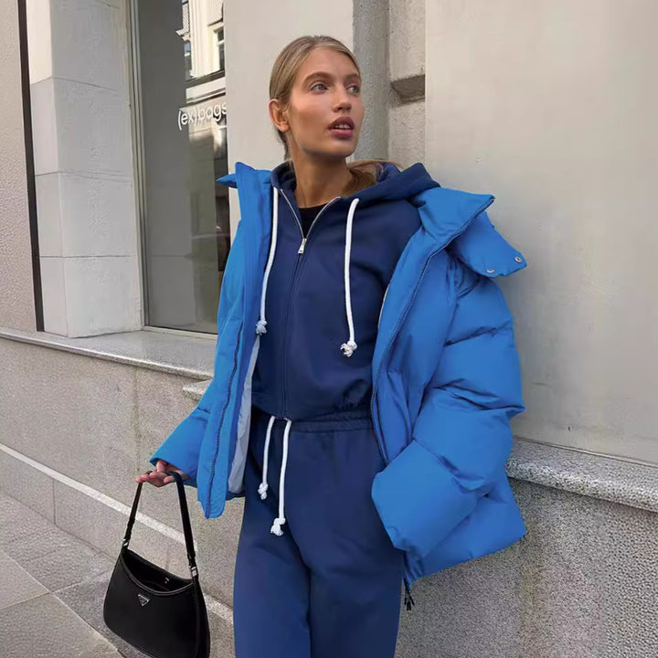 Damen Oversize Steppjacke mit Kapuze und wattierter Thermofüllung Echoarchiv