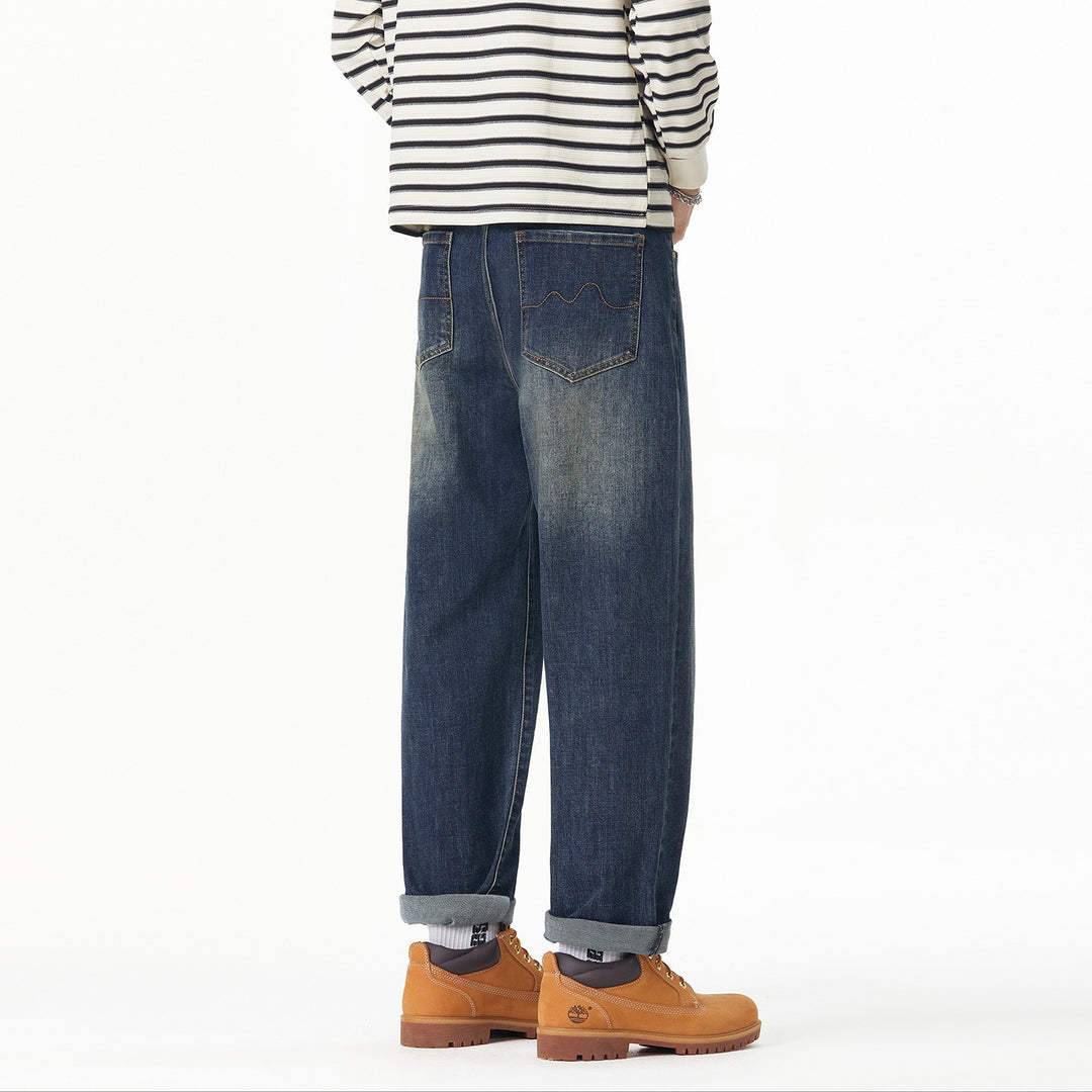 Herren Weite gerade geschnittene Denim-Jeans mit Used‑Wash und Umschlagbund Echoarchiv