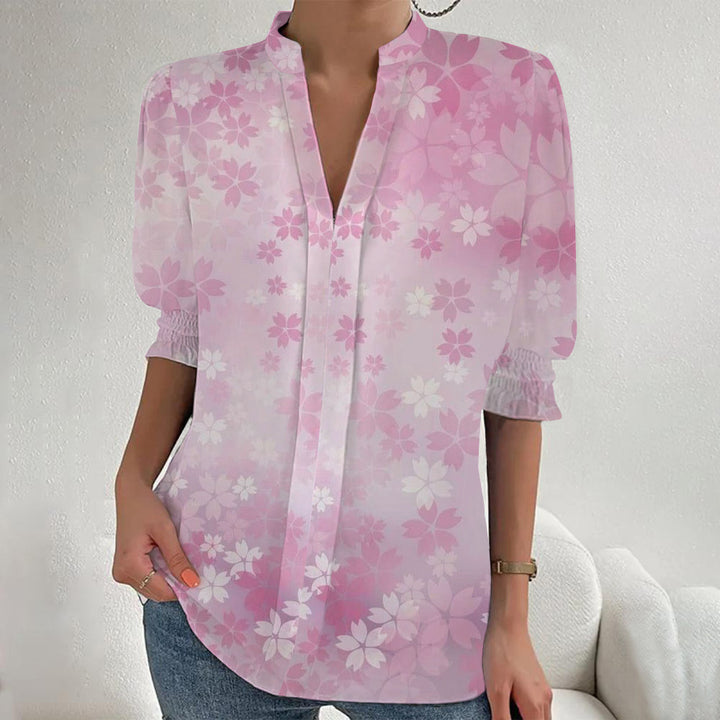 Damen Blumenprint Tunika-Bluse mit Stehkragen, geschlitzter V‑Blende und gerafften 3/4-Ärmeln – Élovi