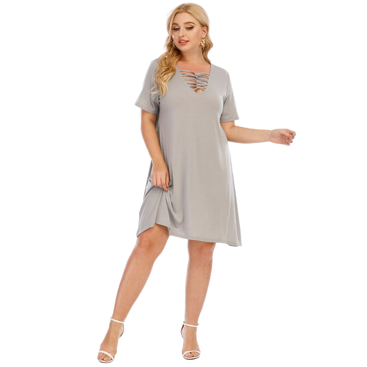Damen lässiges Loose-Fit Kleid mit V-Ausschnitt und modernen Schnürdetails Echo Archiv