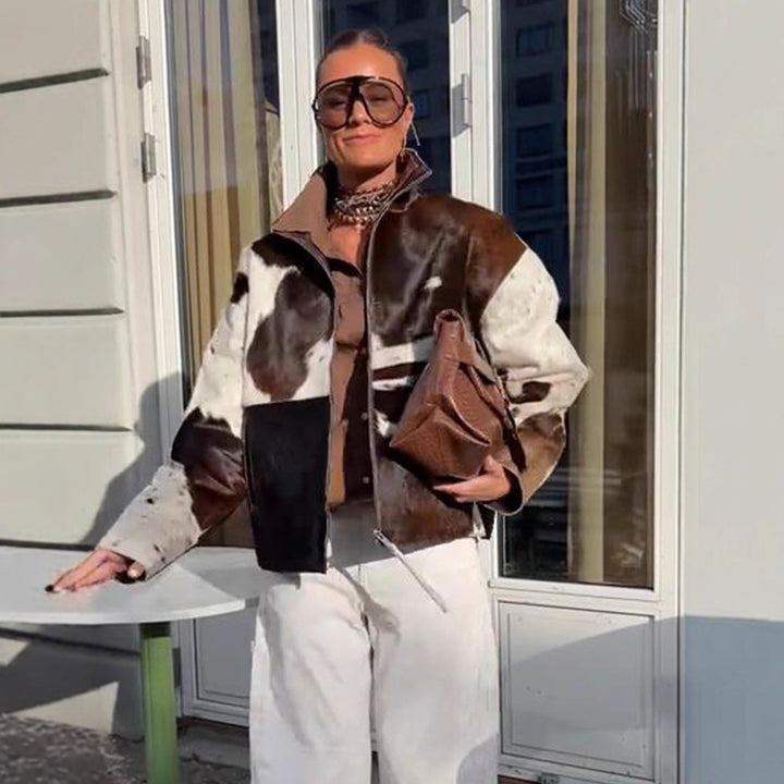 Damen Kurzjacke aus Haarigem Kunstfell mit Patchwork‑Optik und hohem Stehkragen Echoarchiv
