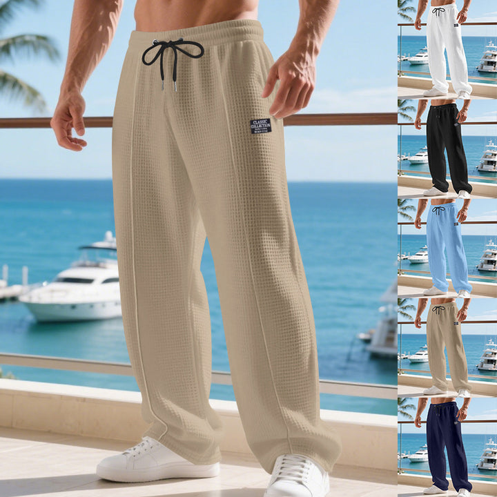 Herren Leichte Waffelstruktur-Loungehose mit elastischem Bund und Eingrifftaschen Echoarchiv