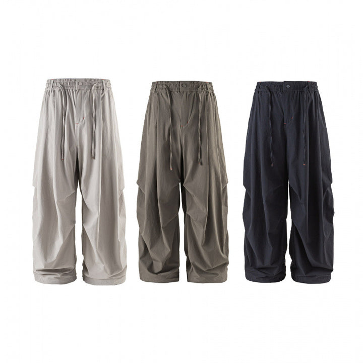 Unisex Weitgeschnittene technische Cargo-Hose mit Gummibund, Kordelzug und Reißverschlusstaschen Echo Archiv
