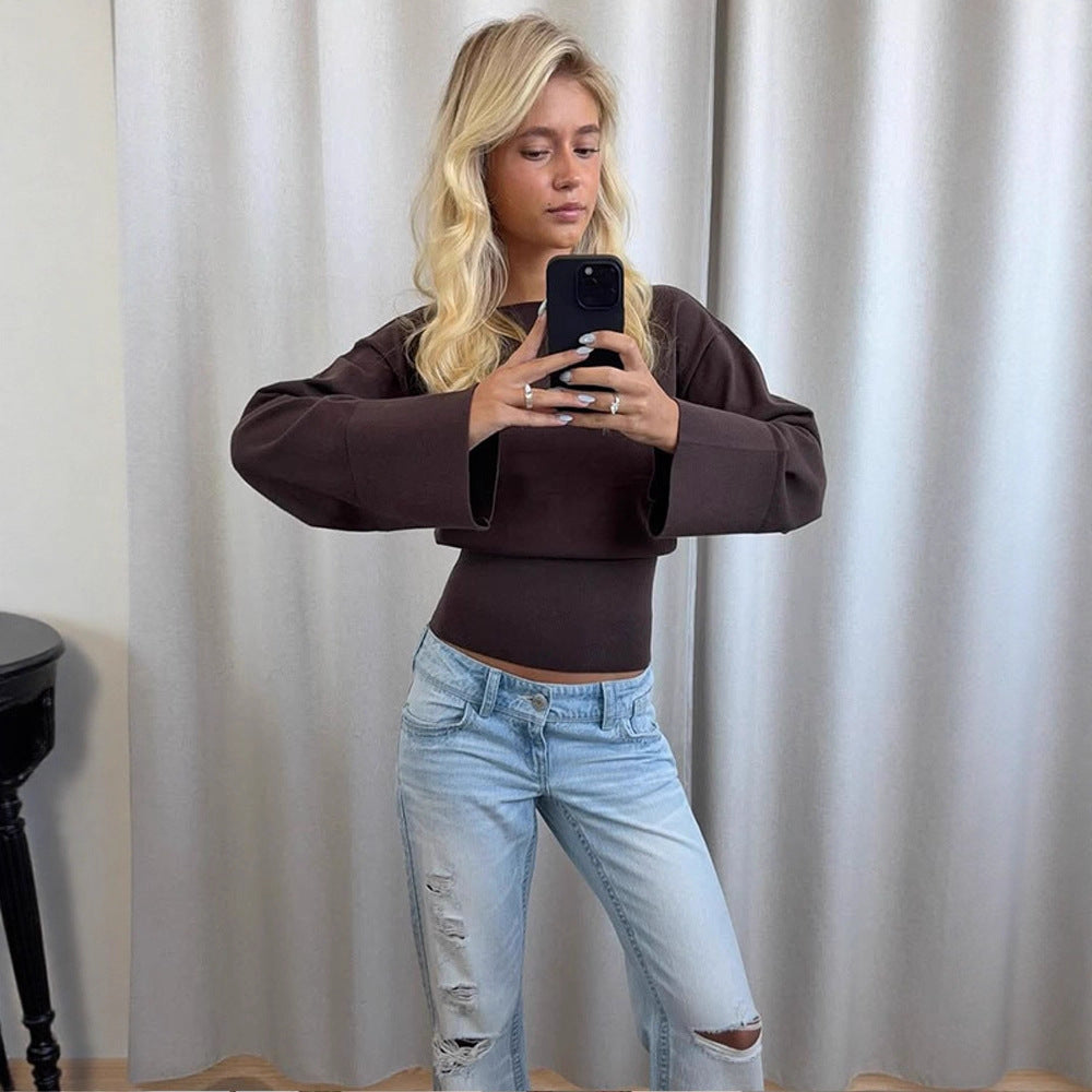 Damen Cropped Feinstrick-Pullover mit weiten Manschettenärmeln und tailliertem Rippbund Echoarchiv