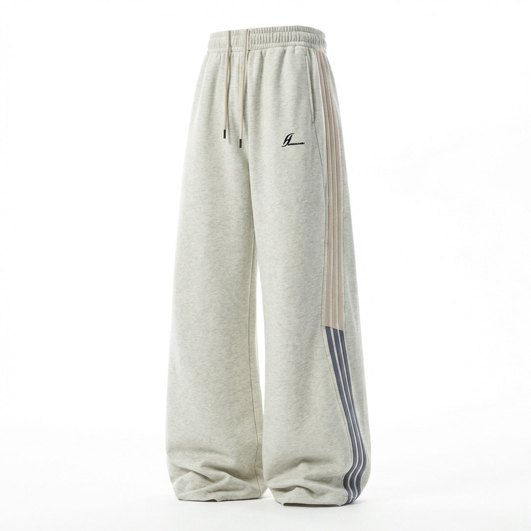 Unisex Extraweite Sweatpants mit Tunnelzug, seitlichem Streifen-Detail und Palazzoschnitt Echo Archiv