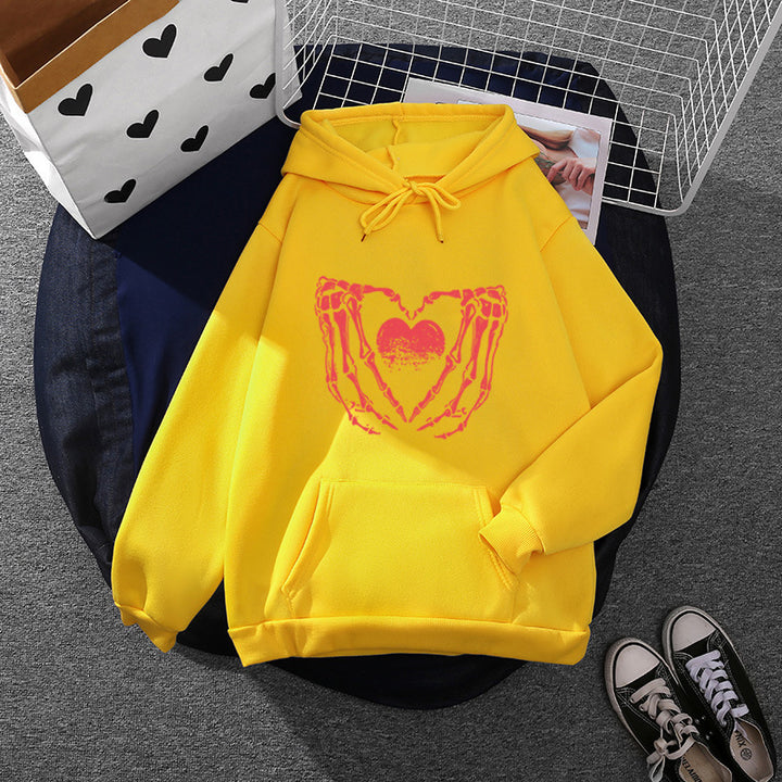 Damen stylischer Kapuzenpullover mit Skeletthand Herzmotiv und Kängurutasche – Auréline
