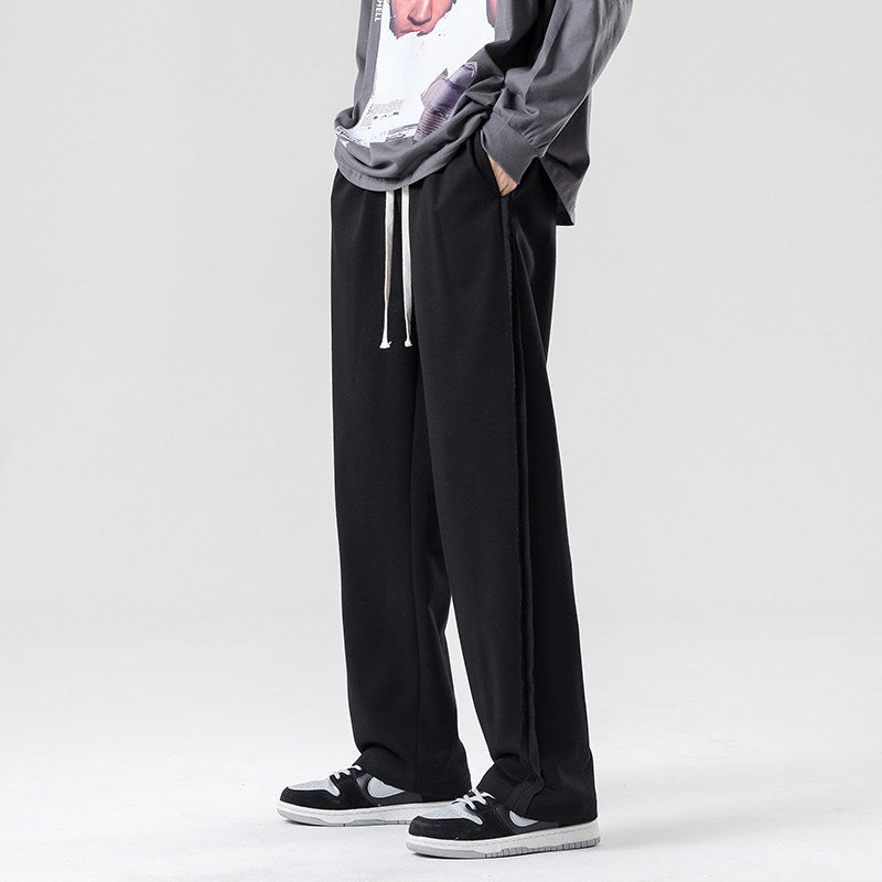 Herren weite Jogginghose im Oversize-Schnitt mit Seitenstreifen, Kordelzug & Fleecefutter Echo Archiv