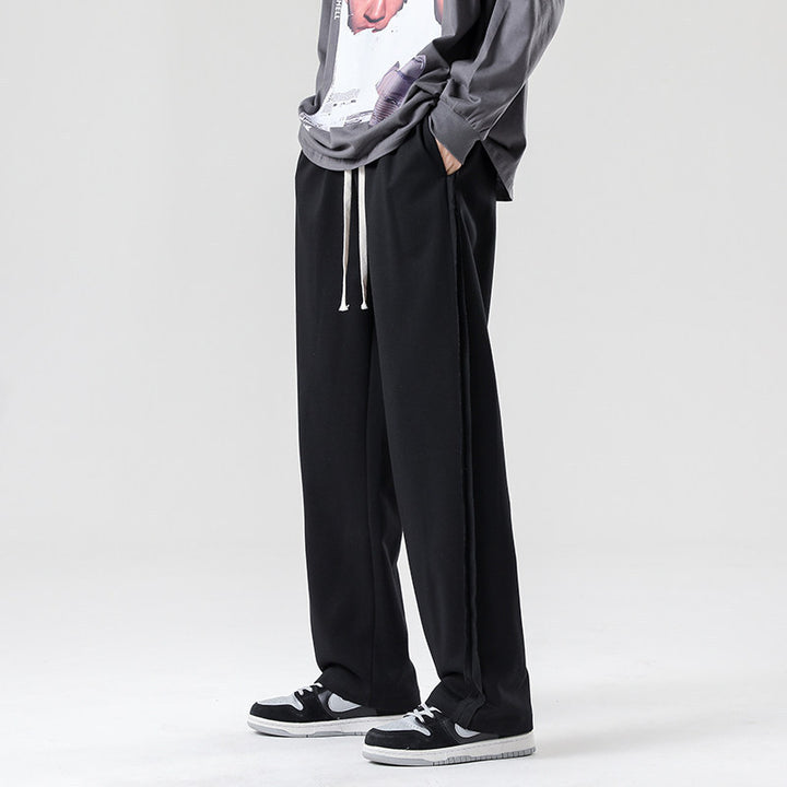 Herren weite Jogginghose im Oversize-Schnitt mit Seitenstreifen, Kordelzug & Fleecefutter Echo Archiv