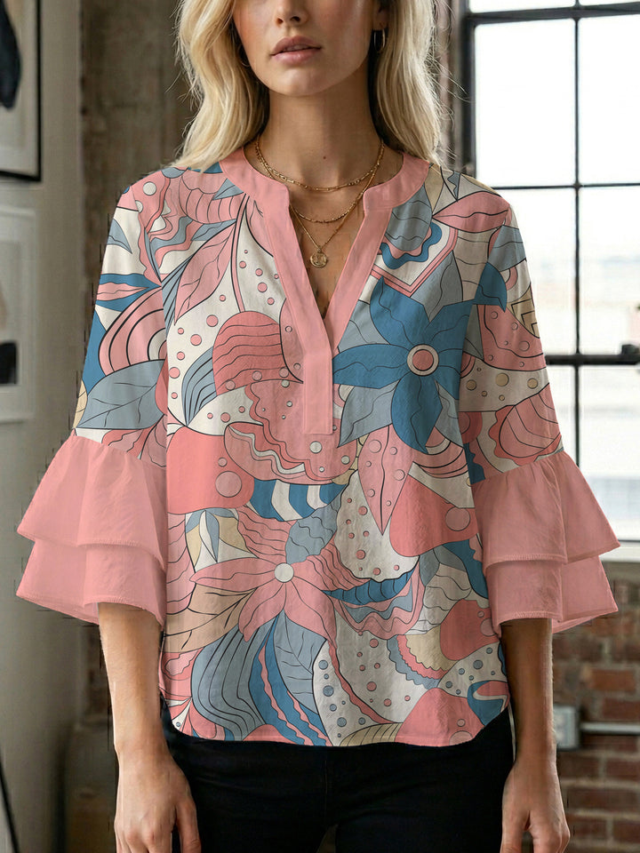 Damen elegantes Oberteil mit voluminösen Rüschensäumen und floralem Design Echo Archiv