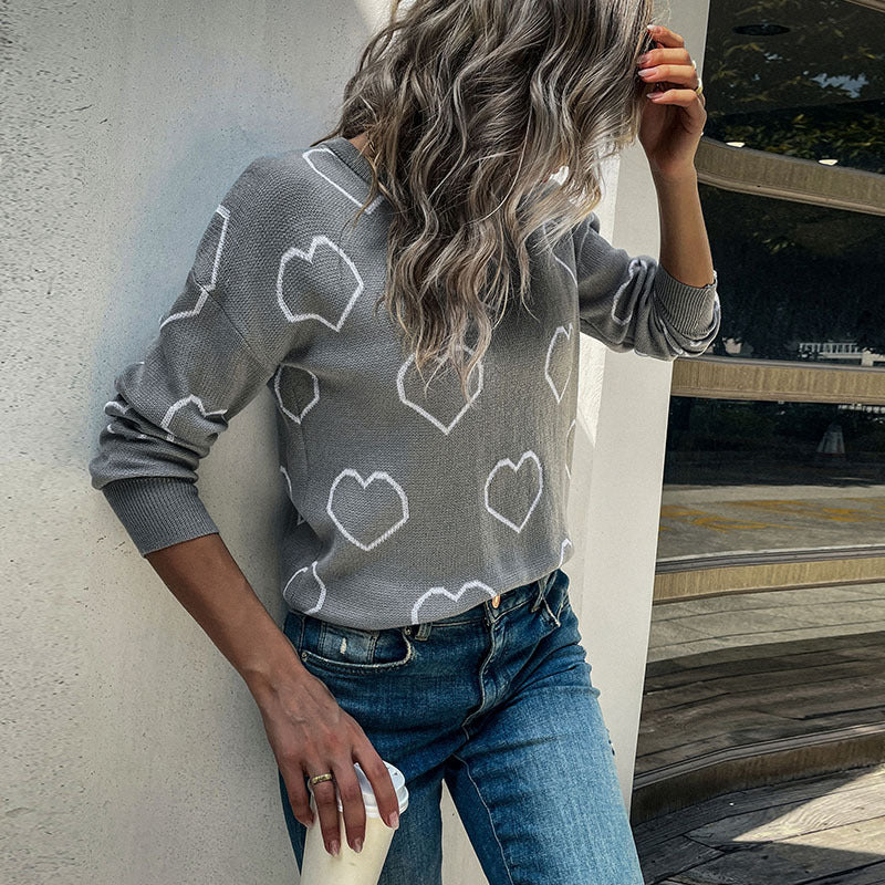 Damen Feinstrickpullover mit Herzmuster und legerer Passform Echoarchiv
