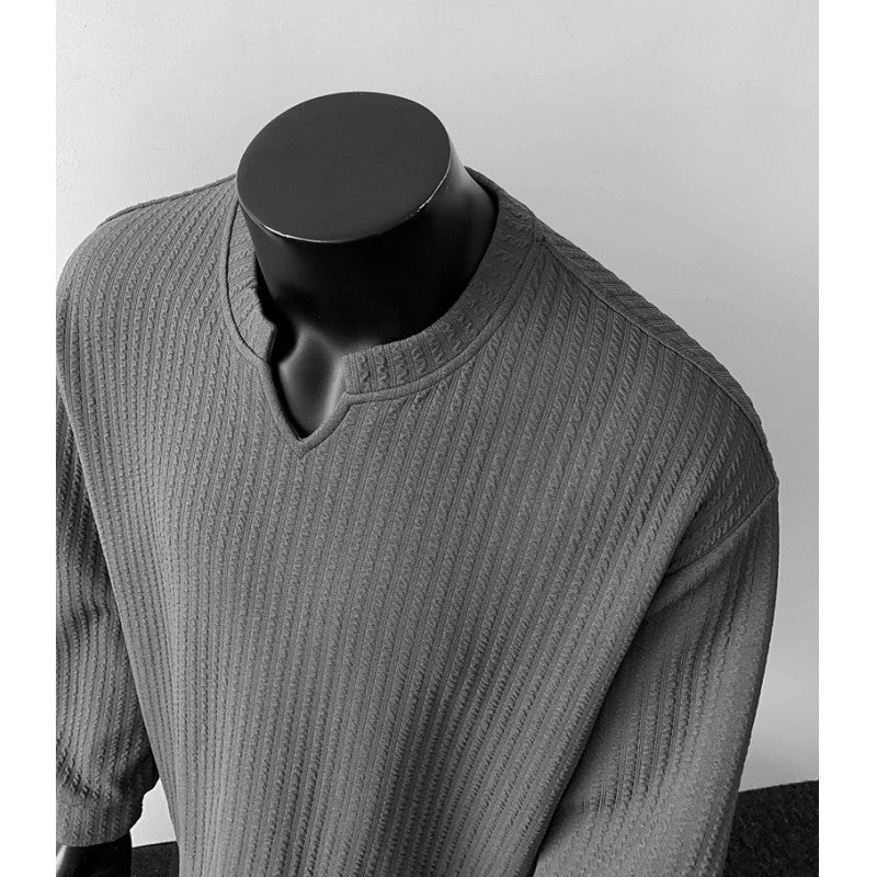 Herren nan grobstrukturierter Strickpullover mit V-förmigem Schlitzkragen und gerundetem Saum Echo Archiv
