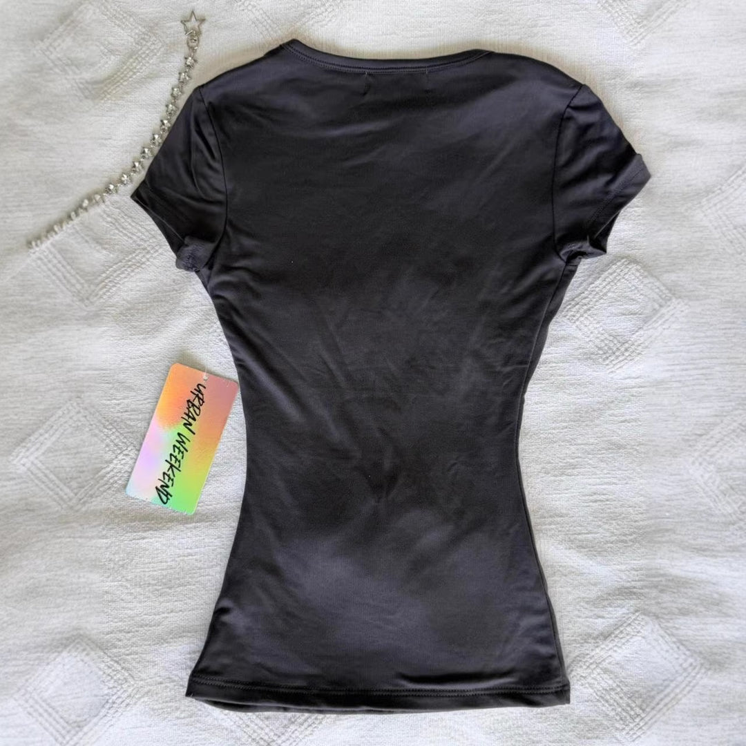 Damen T-Shirt mit funkelndem Grafikkreuz und floralem Design Echo Archiv