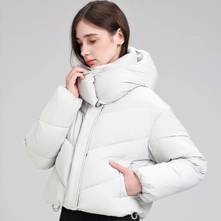 Damen Kurze Pufferjacke mit voluminösem Stehkragen und abnehmbarer Kragenkapuze Echo Archiv