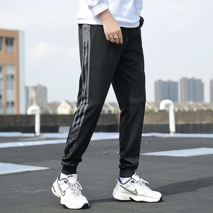 Herren Slim‑Fit Trainingshose mit elastischem Bund, Kordelzug und gerippten Bündchen Echoarchiv