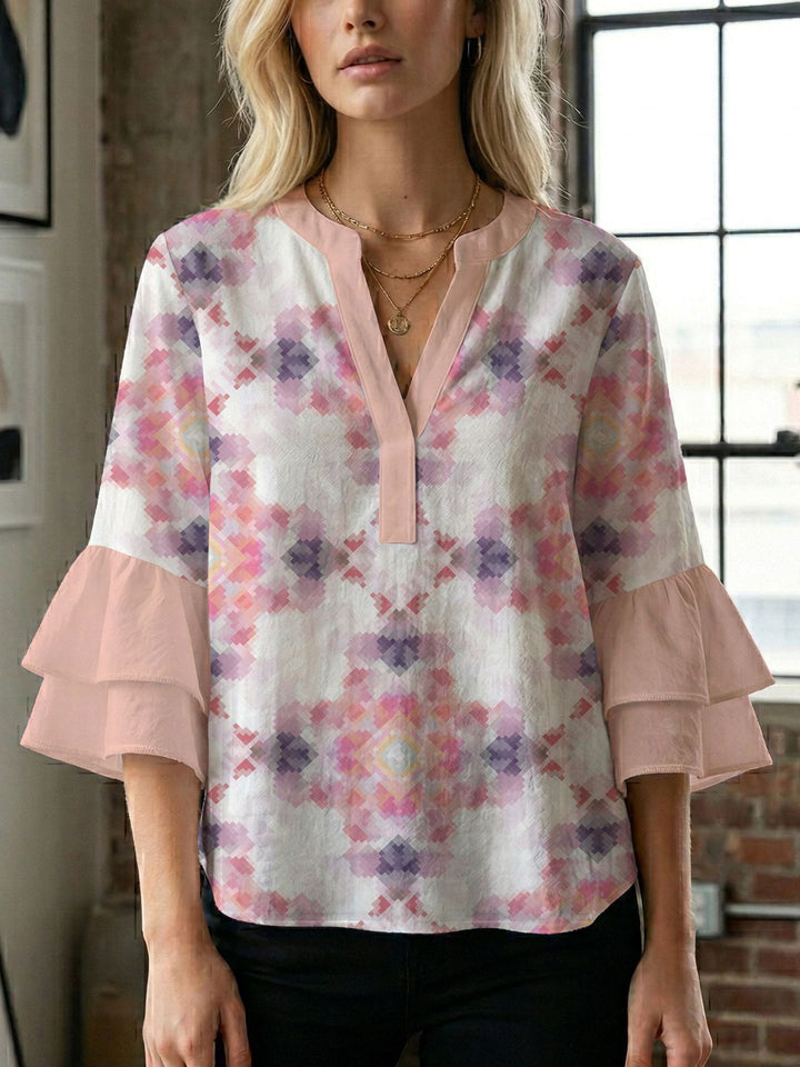 Damen Blusenshirt mit voluminösen Ärmeln und kreativem Druckdesign Echo Archiv