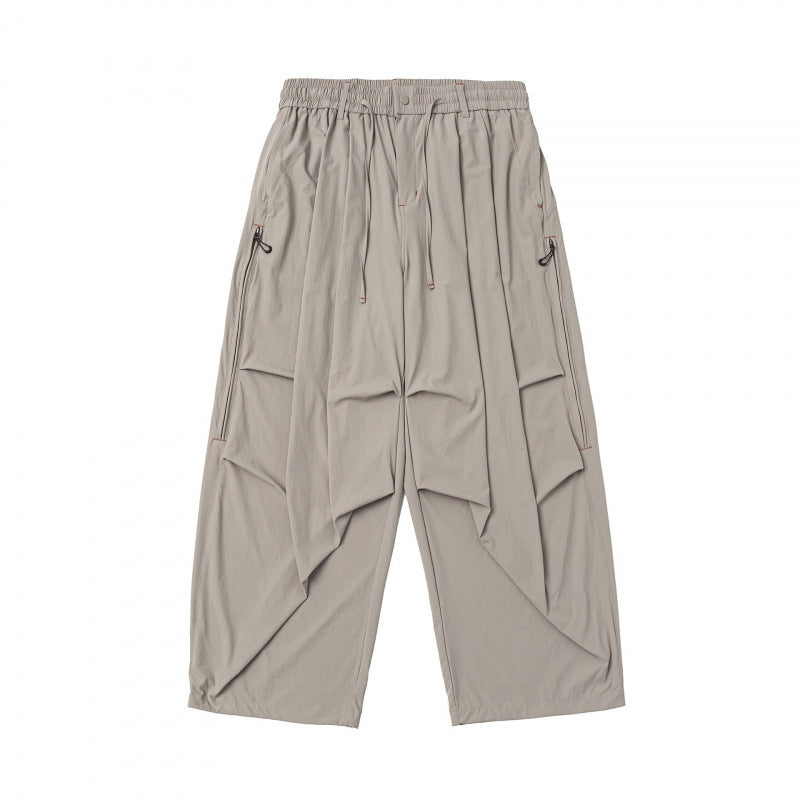 Unisex Weitgeschnittene technische Cargo-Hose mit Gummibund, Kordelzug und Reißverschlusstaschen Echo Archiv