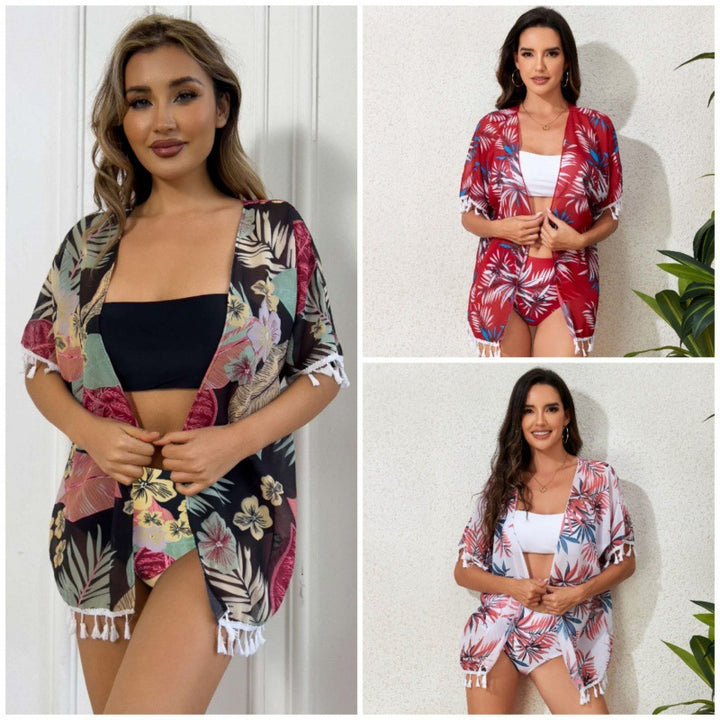 Damen Strandkleid mit floralem Design und fransenverziertem Überwurf Echo Archiv