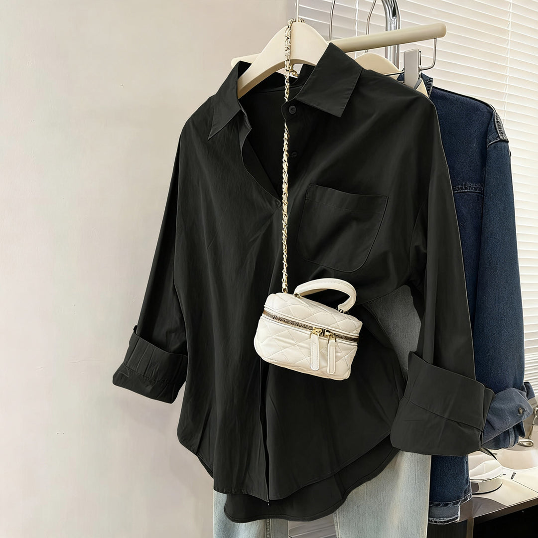 Damen oversized Hemdbluse mit Brusttasche, umgeschlagenen Ärmeln und relaxed Fit – Élovi