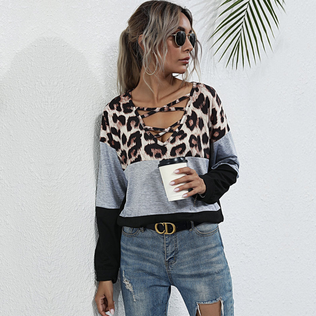 Damen Langarmshirt mit Leoparden-Print Schnürdetail und Colorblock Echoarchiv