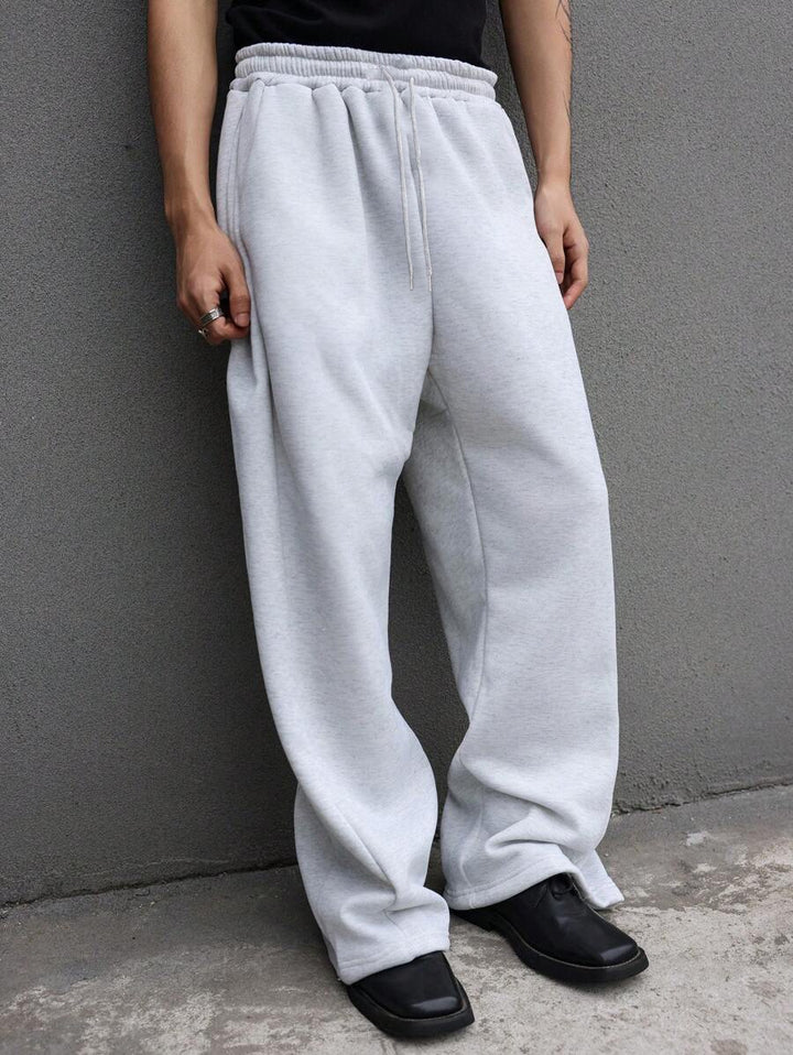Herren Weite Baggy-Jogginghose mit elastischem Bund, Tunnelzug & extra langem Bein Echoarchiv